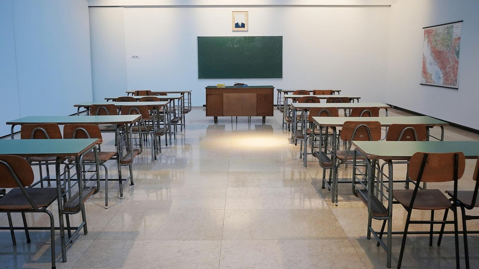 An empty classroom in perfect order — the infrastructure behind ServerMerit